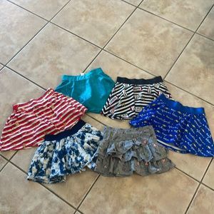 Bundle of 6 Justice skirts size 7